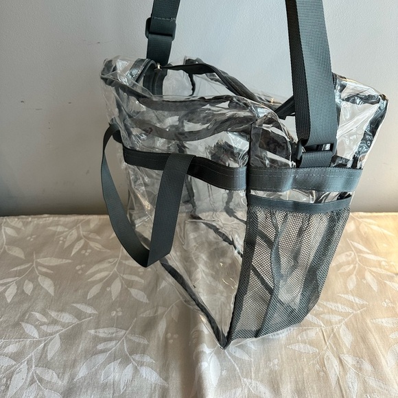 Clear bag. Perfect for concerts or baby bag. Side mesh holders and long strap. - Picture 3 of 7